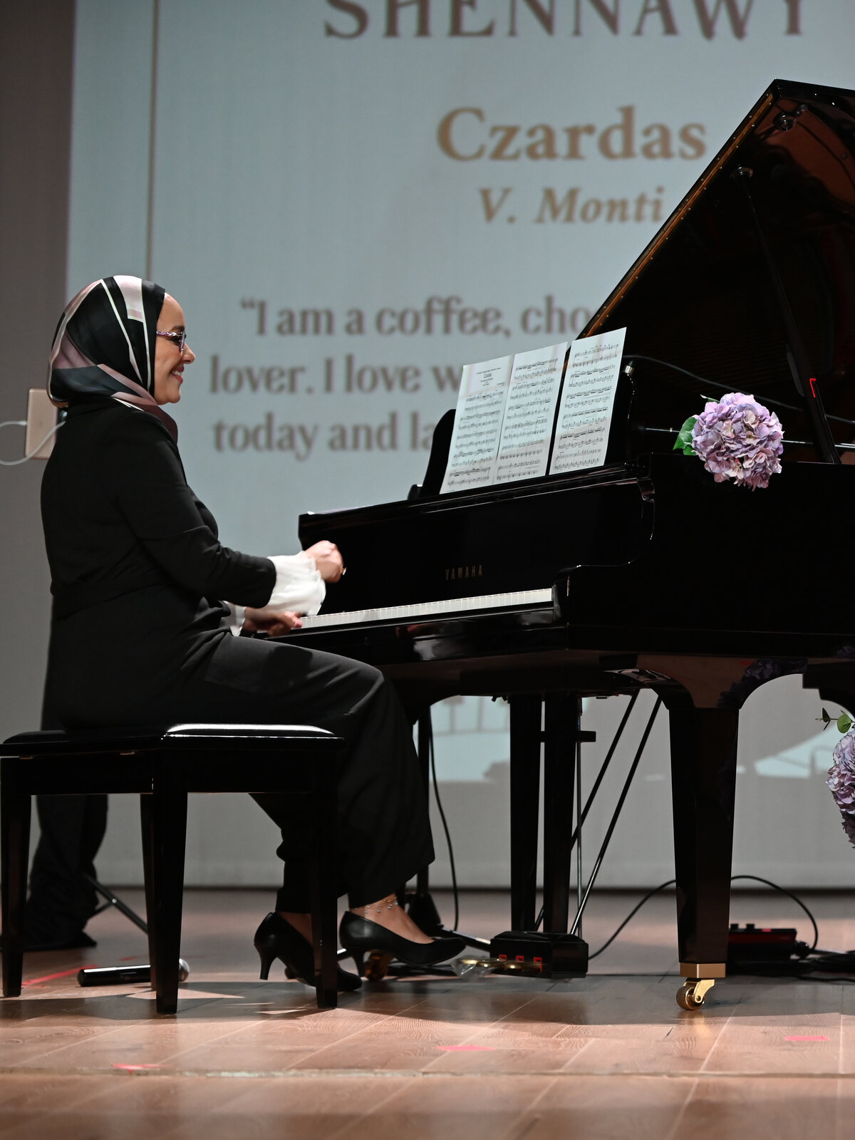 Yasmin Shennawy playing the piano